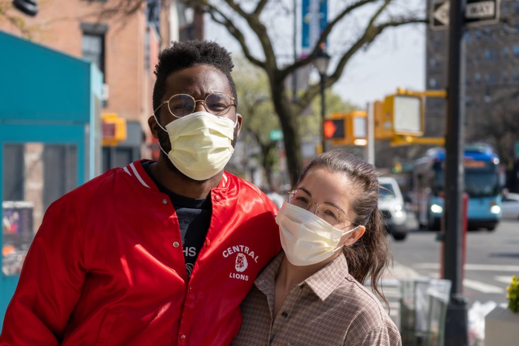 couple with masks on street